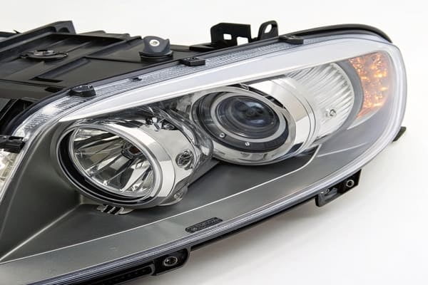 Close-up of a polycarbonate headlight lens and LED module