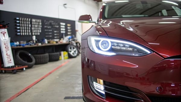A collection of different Tesla headlights for various models