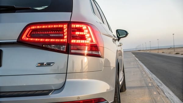 A modern LED tail lamp assembly on a car
