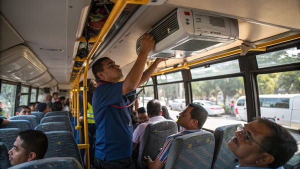 A modern bus air conditioning unit on top of a bus