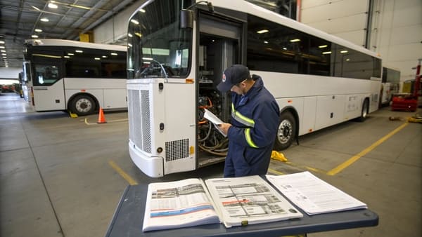 A modern bus with a clearly visible rooftop air conditioning unit