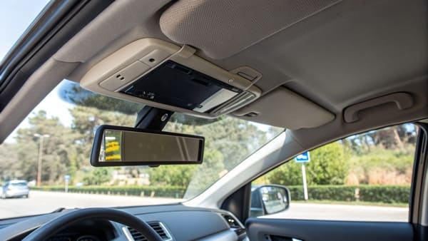 A comparison of a flip-cover mirror and a sliding-cover mirror