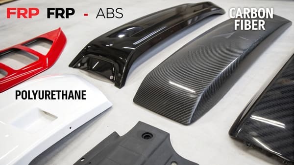 Close-up shot of an unpainted ABS plastic bumper showing its texture