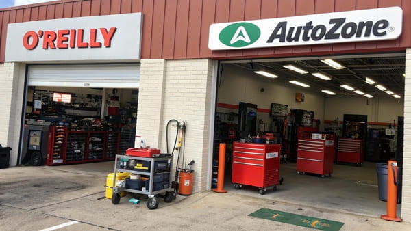 O'Reilly and AutoZone store fronts side by side
