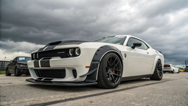 A custom sports car with an aggressive front bumper