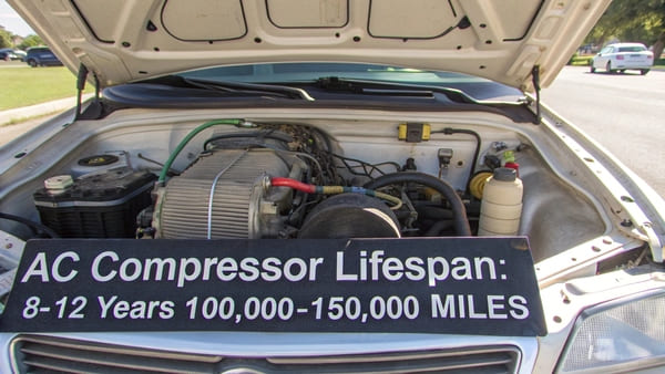 A car's air conditioning compressor unit