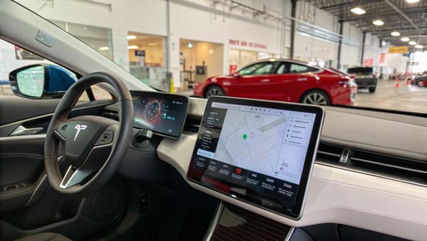 A close-up of a Tesla Model 3 touchscreen